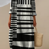ELARA | MONOCHROME MAXI JURK