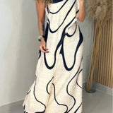 Off-shoulder maxi-jurk met abstracte patroon