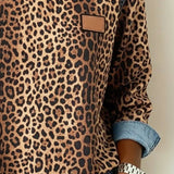 Trui met Luipaardprint en Denim Patchwork
